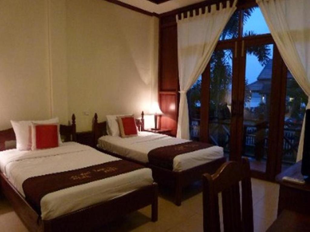 Pon Arena Hotel Muang Không Exterior foto